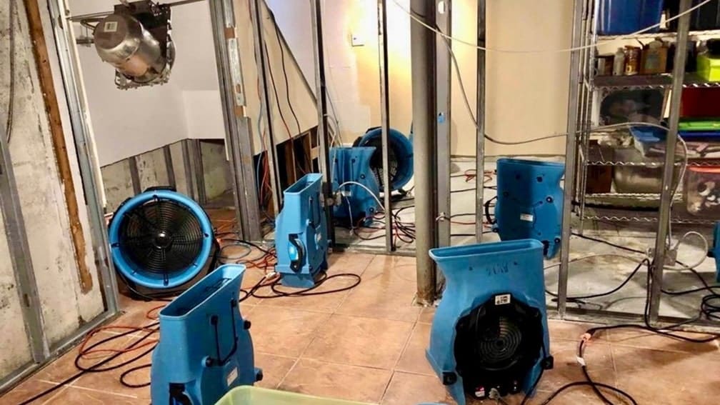 dry out equipment in a flood-damaged basement
